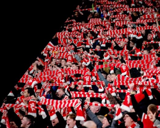 United supporters cheering at Old Trafford